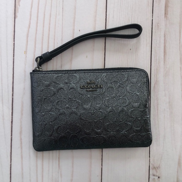 Coach Handbags - Sold!! Coach gun metal logo wristlet in charcoal